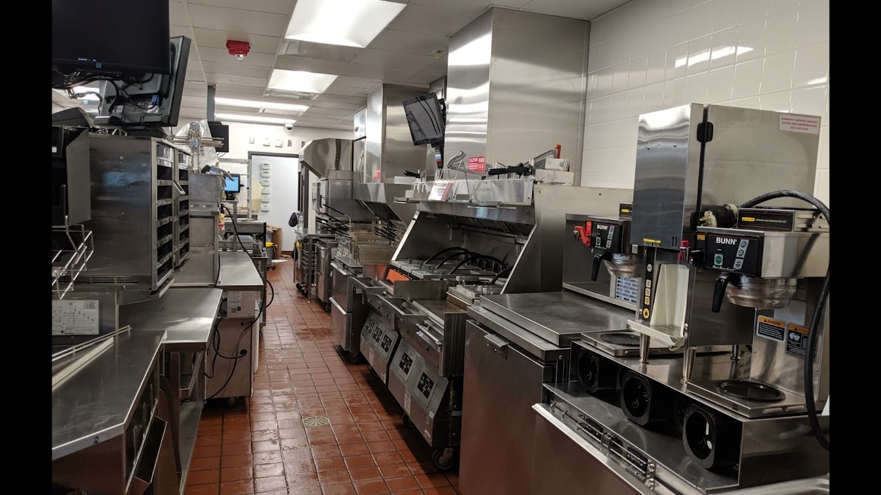 Commercial kitchen interior during pre-construction site survey for QSR renovation programme